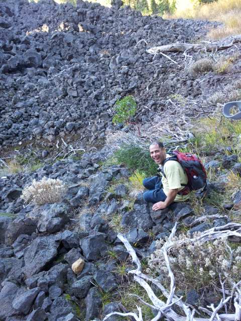 Dan Shaw laughing on a lava field